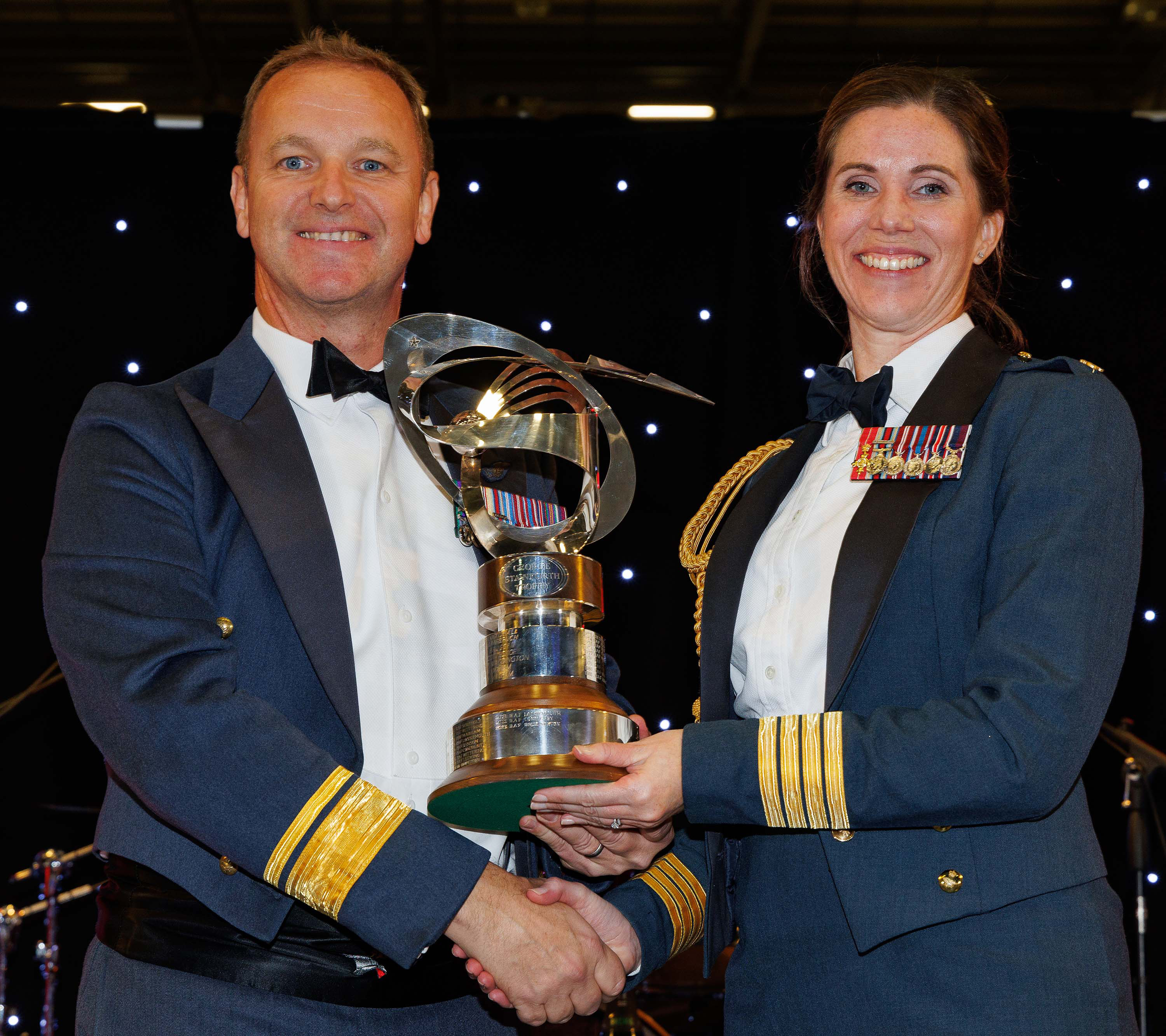 Photo: The George Stainforth Trophy being presented to the Station Commander by Air Officer Commanding No.2 Group, Air Vice-Marshal Appleton.